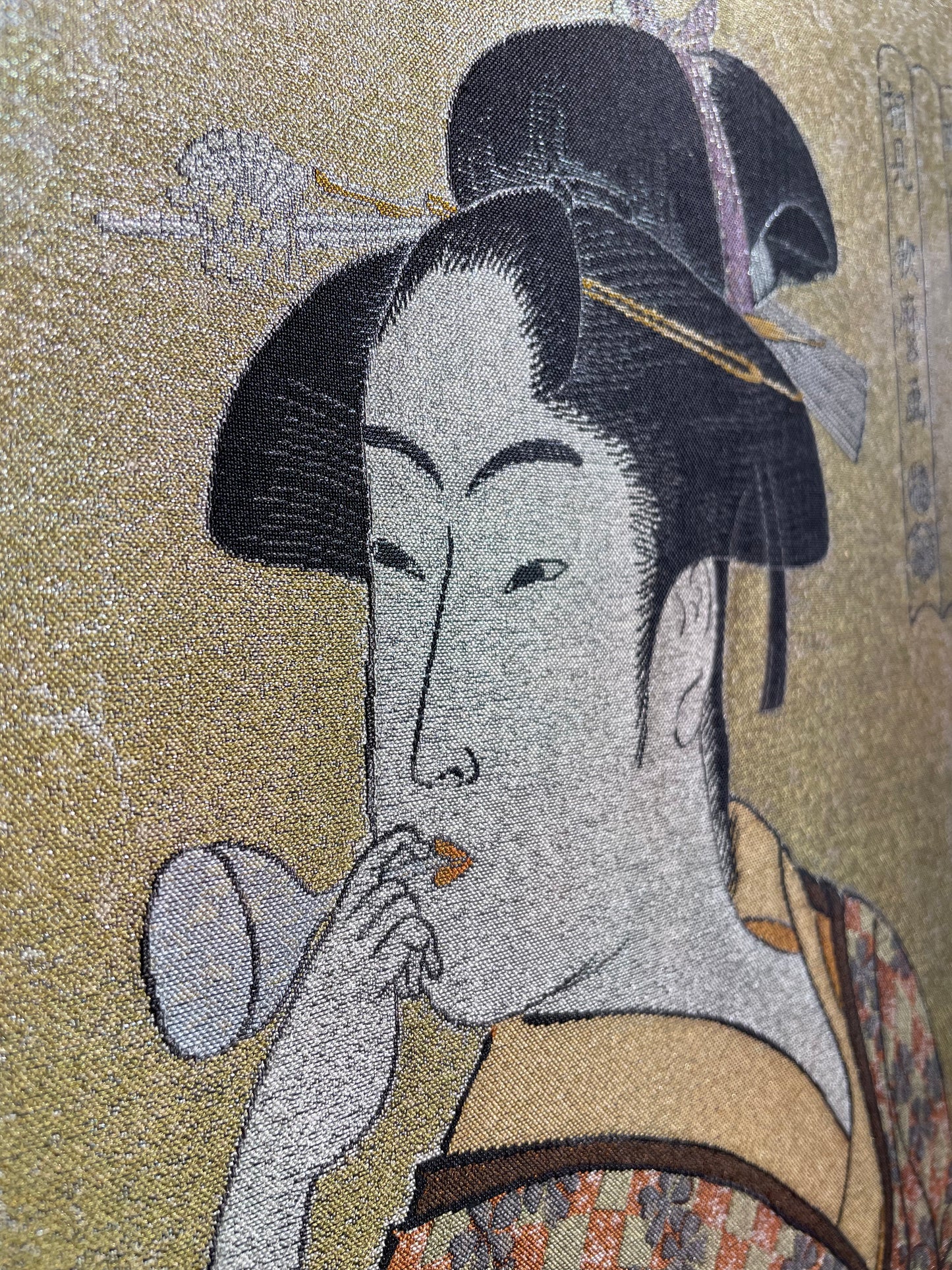 Woman with a Glass Noisemaker (Nishijin textile)